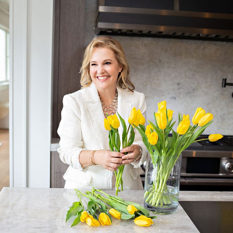 Cindi arranging yellow flowers - Buy or sell with confidence with Cindi Gortner